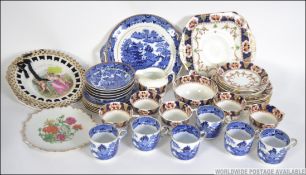 A Staffordshire part service with Imari pattern .