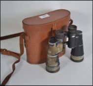 A pair of WW2 era German Goerz of Berlin binoculars complete in the leather carry case