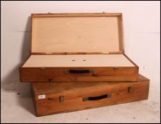 2 vintage handmade polished wooden archery case boxes with hinged centres having carry handles atop.