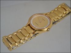 A ladies gold plated Rado Quartz watch