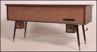 A 1950's laquered mahogany retro stereogram hi-fi system raised on shaped legs by Pye - Black Box