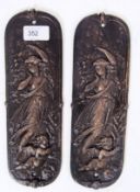 A pair of neo classical style cast iron door plates / finger plates each depicting figures.