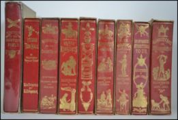 A selection of classic John Leech illustrated novels, all within golden coloured slipcases.