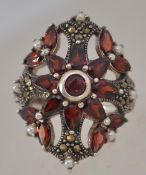 A stunning silver metal, marquisette and ruby garnet stone ring 6.