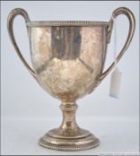 A 19th century silver hallmarked twin handled trophy bearing hallmarks for George Innes possibly.