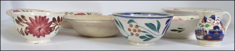 WITHDRAWN A collection of Llanelly welsh pottery ceramics in the manner of Shufflebotham to