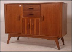 A vintage mid century sideboard with 2 tone oak lower cupboard ,