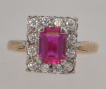 A 9ct gold and ruby garnet stone ladies dress ring,