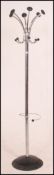 A chrome atomic style retro full height vintage coat and umbrella stand with black trim and