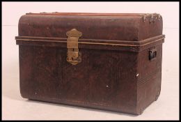 A good vintage tin tack / steamer trunk having the original scrumble finish bearing makers plaque
