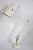 A good early circular base Herbert Terry anglepoise desk top lamp having a pendant shade. 85cm high.