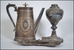 A good pair if 19th century silver plated candle snuffers complete with the tray together with an