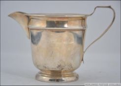 A silver hallmarked creamer jug bearing marks for Edward Viner, Sheffield 1947. Total weight 106.5g.