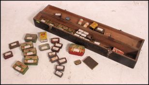 A large early 20th century hinged work box full of vintage tins ( Cigarettes , Oxo , pastilles ,