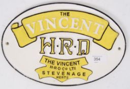 A reproduction metal Vincent Motorcycle advertising sign, with raised painted notation.