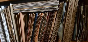 A collection of vintage 78rpm records of various genres, various artists and record labels.