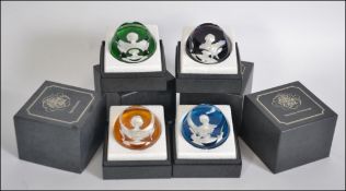 Set of 4 vintage Baccarat boxed Crystal Paperweights with cameos depicting Queen Elizabeth II,