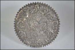 An Ottoman silver mirror - Turkish embossed with flowers,