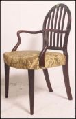 A pair of late 18th / early 19th century Georgian mahogany dining chairs raised on square tapered