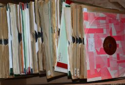 A collection of vintage 78rpm records of various genres, various artists and record labels.