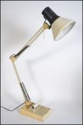 A 20th century anglepoise Industrial style desk lamp in white with square weighted base having 2