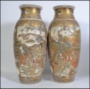 A large pair of 19th century Japanese satsuma ware oversized floor vases,