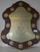 A large silver hallmarked oak backed shield trophy from Shepton Mallett Grammar School - House