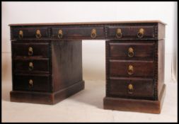 A Victorian oak twin pedestal partners desk.