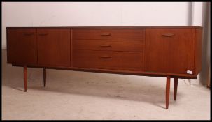 A retro teak wood long sideboard of Danish influence,