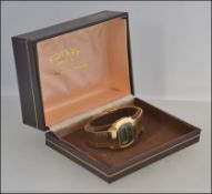 A retro boxed Rotary Quartz LCD Digital watch in a gold finish,