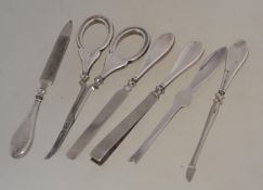 A silver hallmarked manicure set to include scissors,