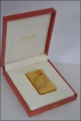 A stunning gold plated Dupont Stylo Plume L2 045290 Laque De Chine cigarette lighter complete in