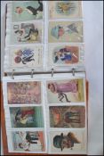 COMIC POSTCARDS. Collection of 116 in album. Mostly vintage around the pre 2nd war era.