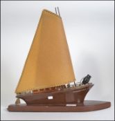 A 20th Century boat shaped wooden table lamp 'Margaret Ann'.