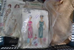 A good collection of vintage sewing patterns for both male and female garments many with templates