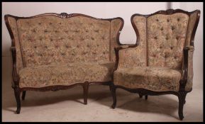 An early 20th century French upholstered three - piece over stuffed button back Chesterfield suite