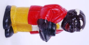 A 20th century cast iron novelty style money box in the form of a man holding hat. Hand painted.