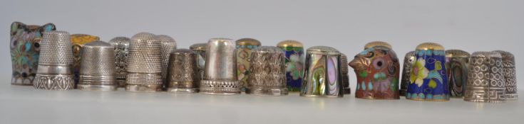 A collection of silver hallmarked thimbles mainly from the 20th century to include examples from