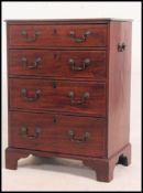 A Georgian bachelors mahogany chest of drawers of small proportions.