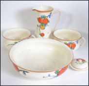 A 1930's Crown Ducal ceramic bathroom set comprising jug and bowl,