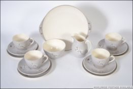 A Royal Doulton retro 1950's ' Frost Pine ' pattern part tea service comprising cups, saucers,