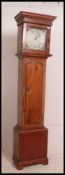 A 19th century country oak painted face longcase clock.
