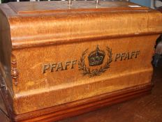 A good Edwardian Pfaff sewing machine complete in the case together with the original notation.