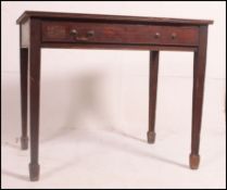 A 19th century mahogany writing desk, leather inset, above a single long drawer,