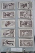 A good album of assorted vintage cigarette cards - mostly full sets - to include Churchman's,