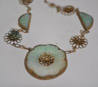 An interesting vintage Chinese gilt filigree decorated necklace with flower decoration and filigree