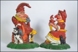 Early 20th century Punch and Judy , Mr and Mrs Punch , cast iron doorstop's ,