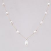 A 10ct gold & pearl stations necklace Ja