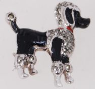A 1950's enamel & marcasite poodle brooc