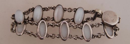 A sterling silver cabochon link bracelet